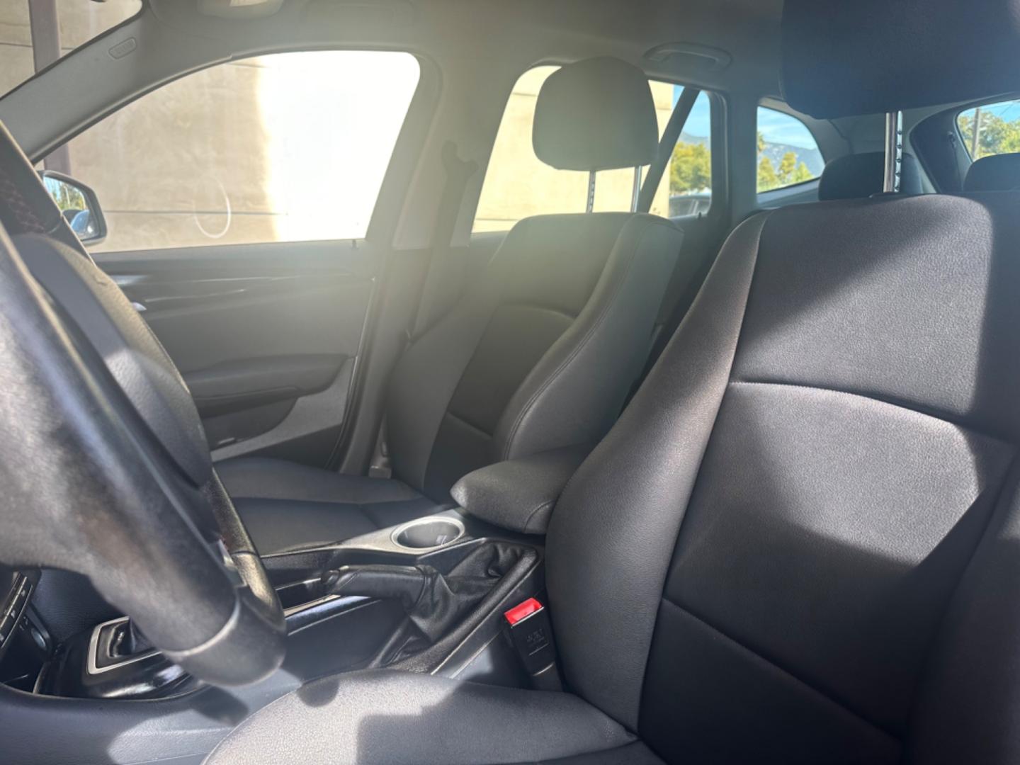 2013 Silver Metallic /Black BMW X1 sDrive28i (WBAVM1C59DV) with an 2.0L L4 DOHC 16V engine, 8-Speed Automatic transmission, located at 30 S. Berkeley Avenue, Pasadena, CA, 91107, (626) 248-7567, 34.145447, -118.109398 - Leather Seats! Premium Wheels! This 2013 BMW X1 sDrive28i looks and drives well. Bad Credit? We can help! We are the bank. All our cars are thoroughly inspected and reconditioned by our technicians. FREE CARFAX report. Stop by or call to speak with our friendly staff. Whether you have bad credit, no - Photo#10